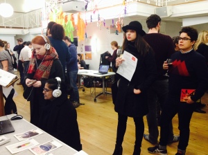 Interested visitors to the Things We Keep presentation at the showcase event, February 2016.